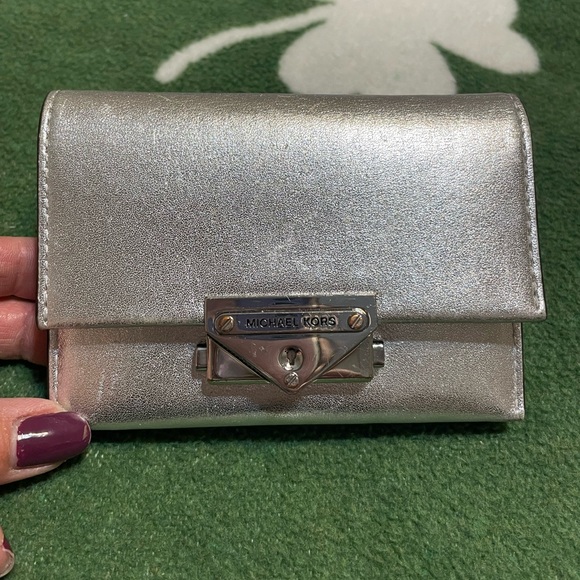 Michael Kors Handbags - Michael Kors Metallic Silver Wallet